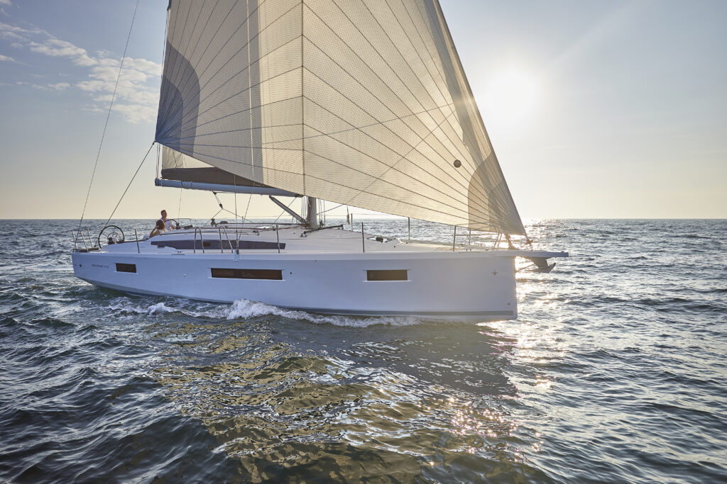 jeanneau 410 exterior with white hull and pale sail