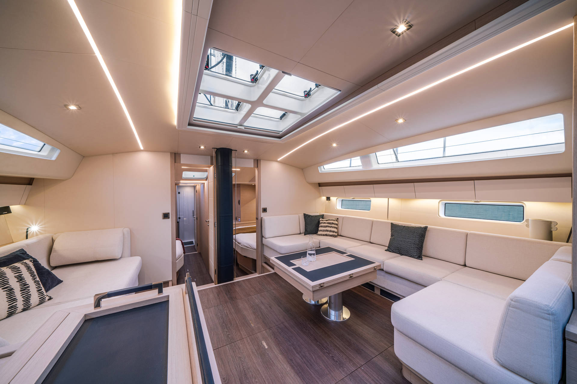 jeanneau 65 interior featuring its spacious lounge area