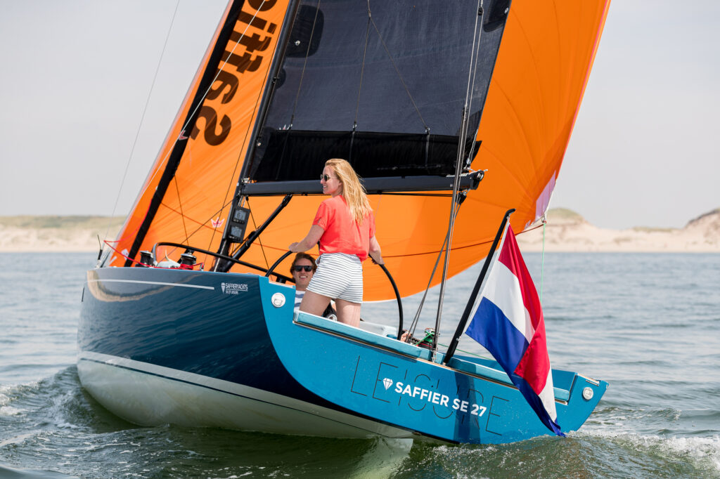 Saffier SE 27 Leisure with blue body and orange sail