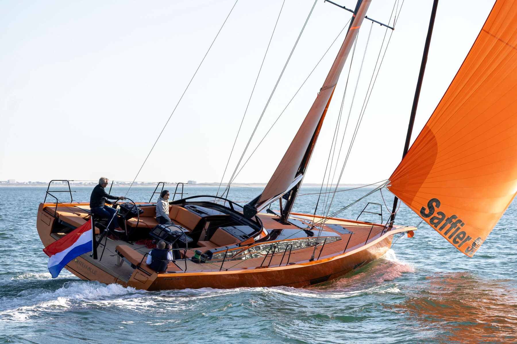 Saffier SL 46 MED cruising with an orange body and sail