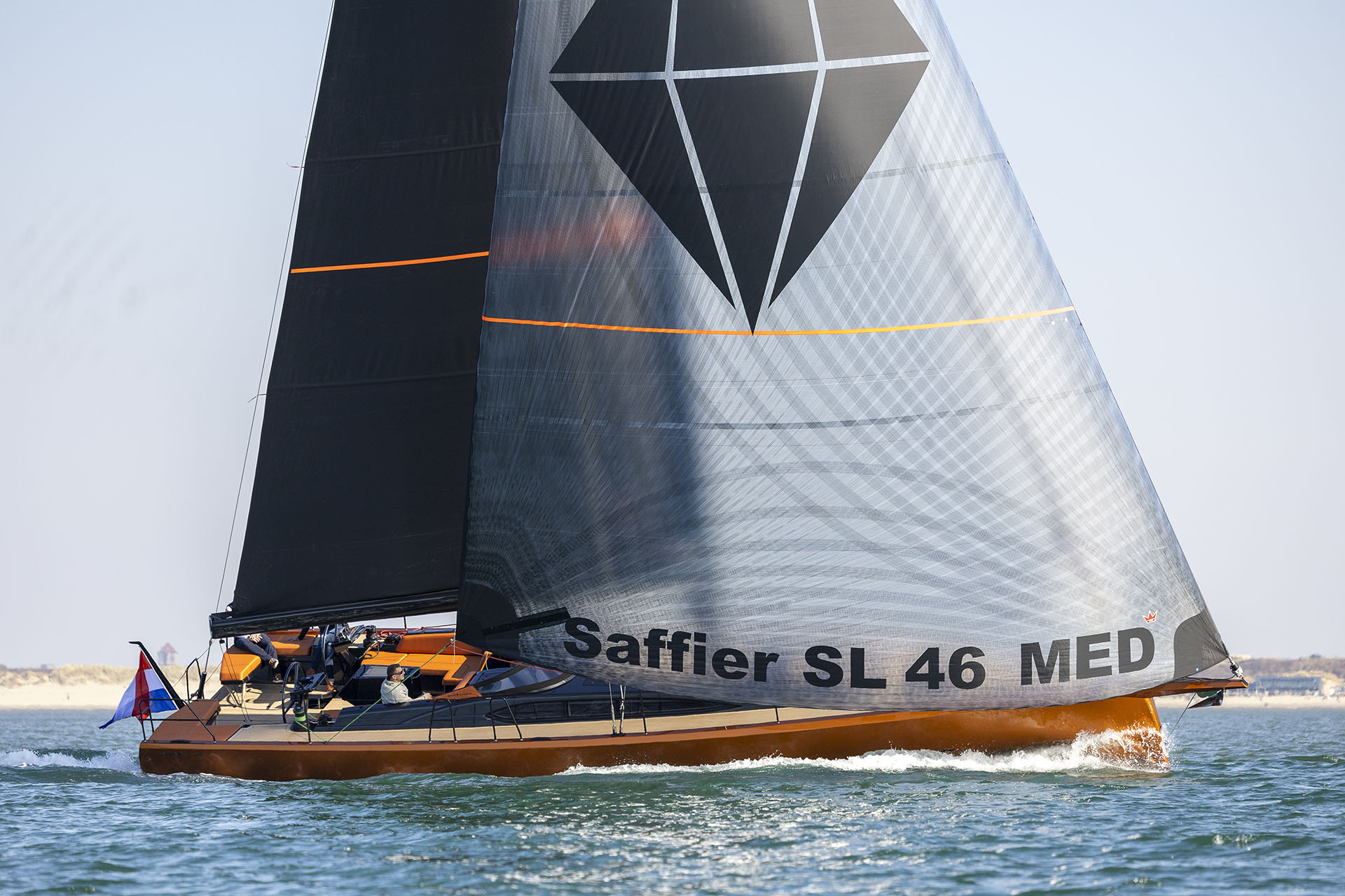 Saffier SL46 MED with orange hull and grey sails. © Sander van der Borch