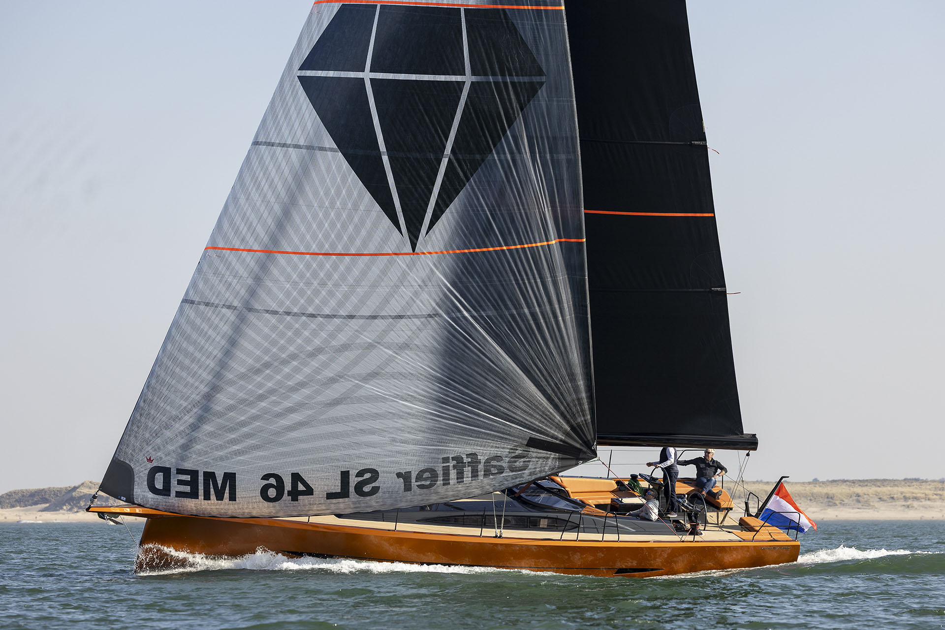 Saffier SL46 MED with orange hull and grey sails. © Sander van der Borch